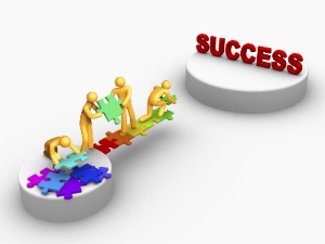 men building bridge to the word success