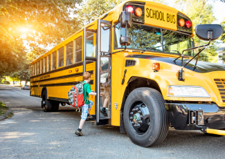 Students getting on the bus