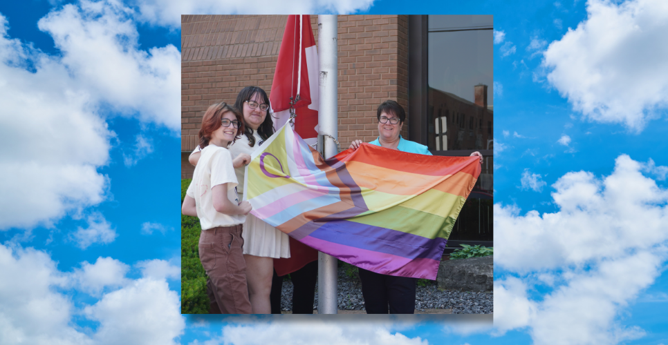 Director Houston with Students at 2025 Pride Flag raising