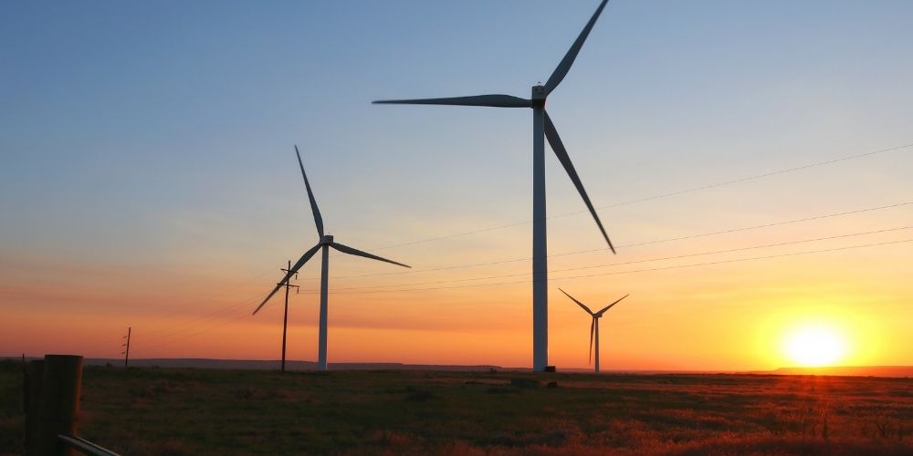 Image of windmills at sunset