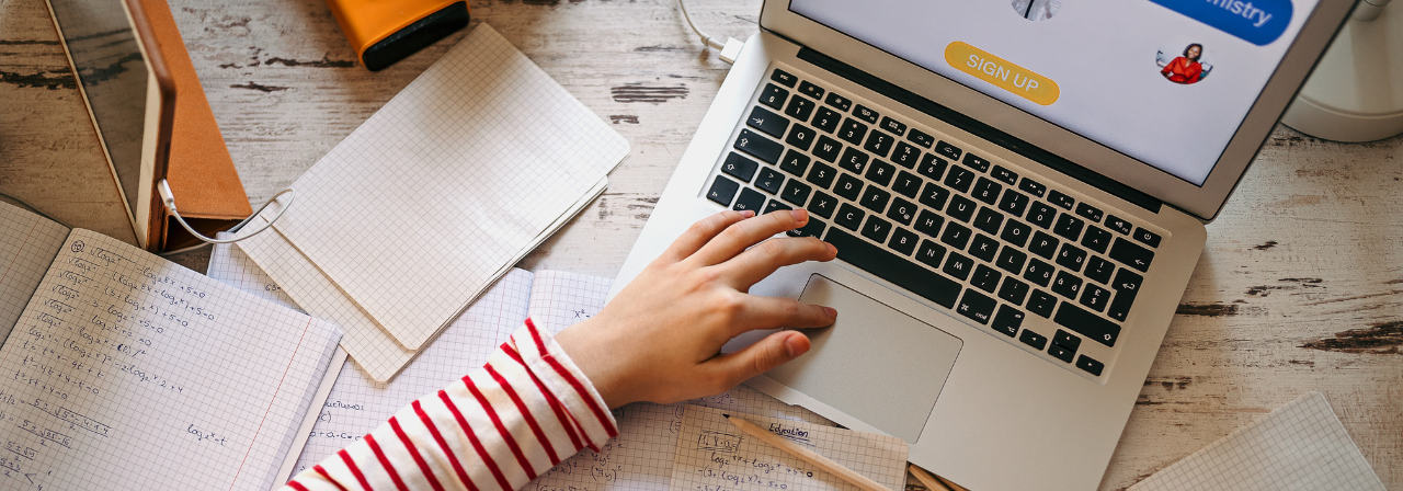 Student Typing on a laptop