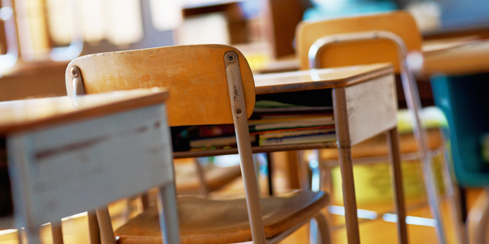 Desks in an empty classroom