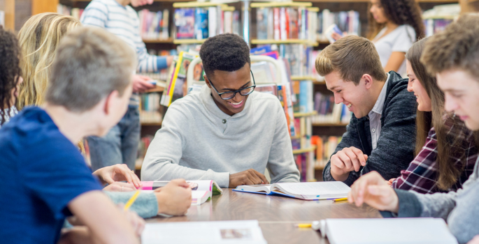Students working in the library