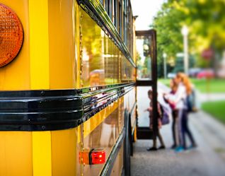 Students getting on the bus